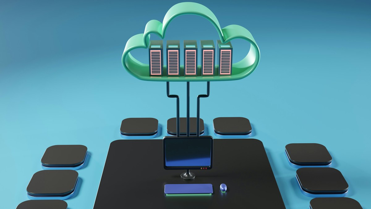 Green cloud containing servers connected to a desktop computer and surrounding devices.